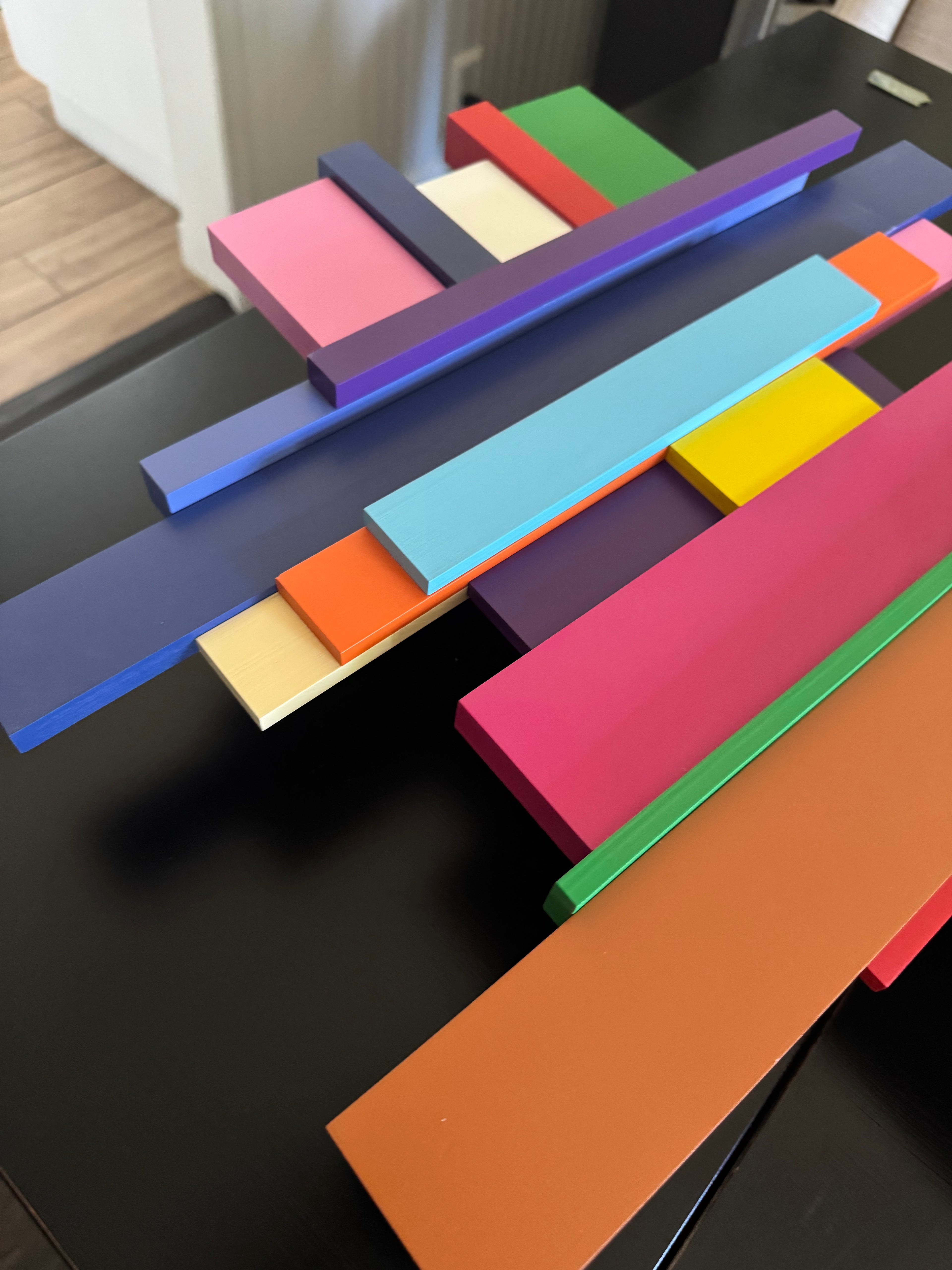 Colorful building blocks on a dark surface